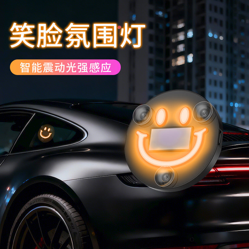 Car wireless solar-powered smiley face triangular window six-color neon interior ambient light LED car mount